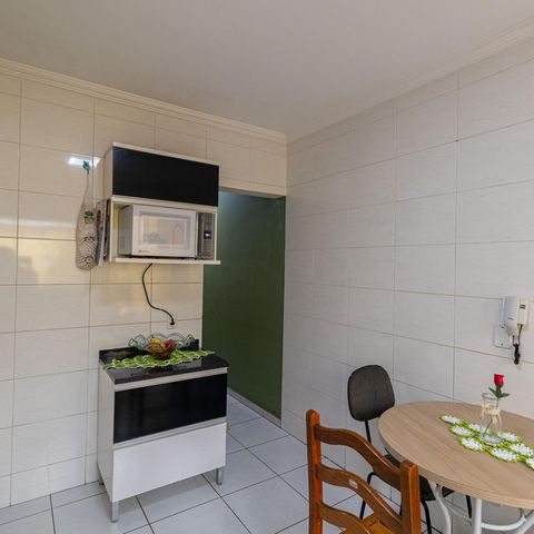 Casa à venda com 147m², 3 quartos e 3 vagas Casa à venda com 147m², 3 quartos e 3 vagasCozinha