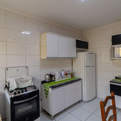 Casa à venda com 147m², 3 quartos e 3 vagas Casa à venda com 147m², 3 quartos e 3 vagasCozinha