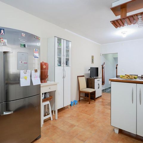 Casa à venda com 125m², 3 quartos e 2 vagas Casa à venda com 125m², 3 quartos e 2 vagasCopa e cozinha