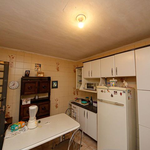 Casa à venda com 125m², 3 quartos e 4 vagas Casa à venda com 125m², 3 quartos e 4 vagasCozinha