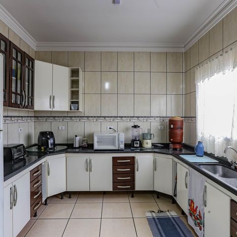 Casa à venda com 240m², 3 quartos e 5 vagas Casa à venda com 240m², 3 quartos e 5 vagasCozinha
