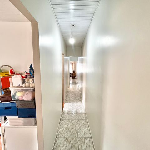 Casa à venda com 125m², 3 quartos e 2 vagasCorredor