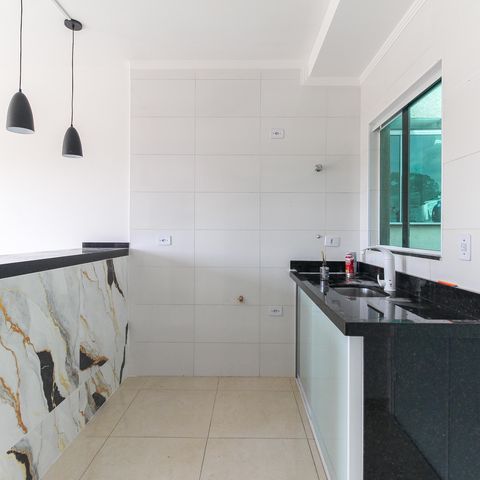 Casa à venda com 52m², 2 quartos e 1 vaga Casa à venda com 52m², 2 quartos e 1 vagaCozinha