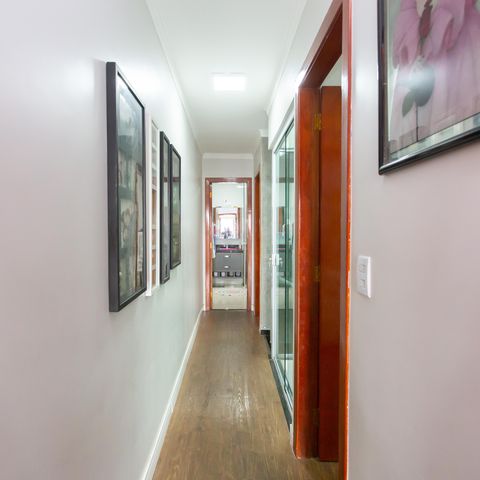 Casa à venda com 75m², 3 quartos e 2 vagas Casa à venda com 75m², 3 quartos e 2 vagasCorredor