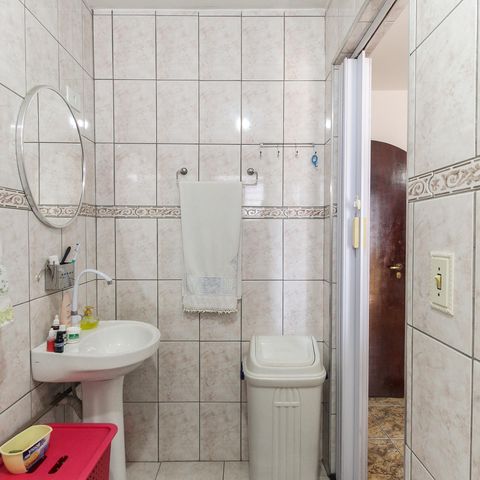 Casa à venda com 120m², 4 quartos e 2 vagas Casa à venda com 120m², 4 quartos e 2 vagasBanheiro da Suíte 1