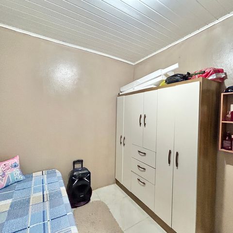 Casa à venda com 60m², 2 quartos e 2 vagas Casa à venda com 60m², 2 quartos e 2 vagasQuarto 1