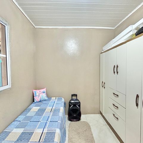 Casa à venda com 60m², 2 quartos e 2 vagas Casa à venda com 60m², 2 quartos e 2 vagasQuarto 1