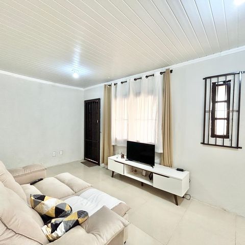 Casa à venda com 60m², 2 quartos e 2 vagas Casa à venda com 60m², 2 quartos e 2 vagasSala