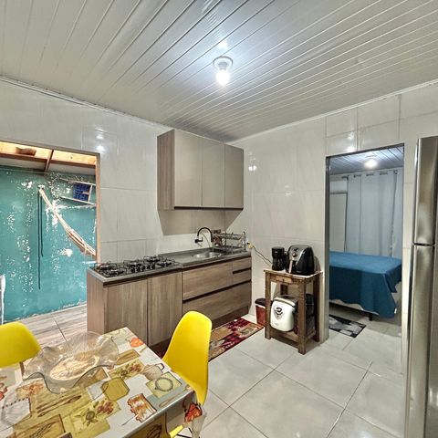 Casa à venda com 60m², 2 quartos e 2 vagas Casa à venda com 60m², 2 quartos e 2 vagasCozinha
