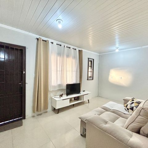 Casa à venda com 60m², 2 quartos e 2 vagas Casa à venda com 60m², 2 quartos e 2 vagasSala