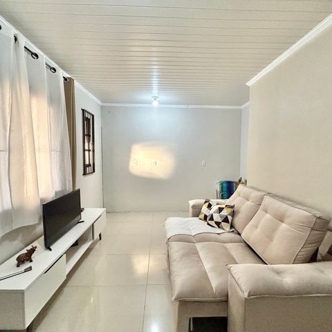 Casa à venda com 60m², 2 quartos e 2 vagas Casa à venda com 60m², 2 quartos e 2 vagasSala