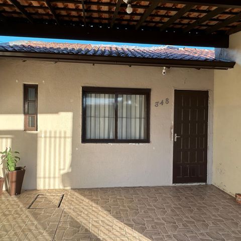 Casa à venda com 60m², 2 quartos e 2 vagas Casa à venda com 60m², 2 quartos e 2 vagasFachada
