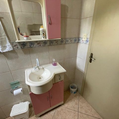 Casa à venda com 300m², 3 quartos e 2 vagasBanheiro da Suíte