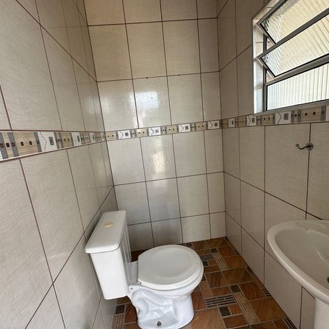 Casa à venda com 260m², 3 quartos e 4 vagasBanheiro de Serviço