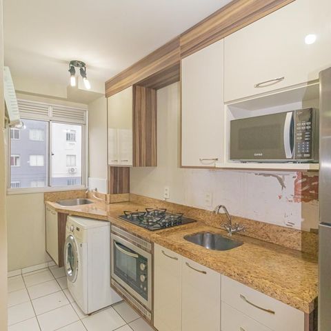 Apartamento à venda com 46m², 2 quartos e 1 vaga Apartamento à venda com 46m², 2 quartos e 1 vagaCozinha e Área de Serviço