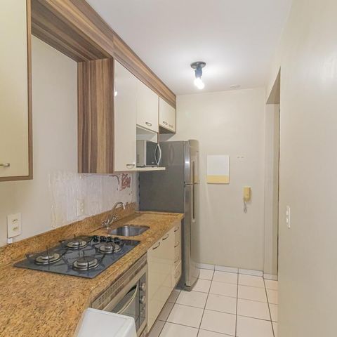 Apartamento à venda com 46m², 2 quartos e 1 vaga Apartamento à venda com 46m², 2 quartos e 1 vagaCozinha e Área de Serviço