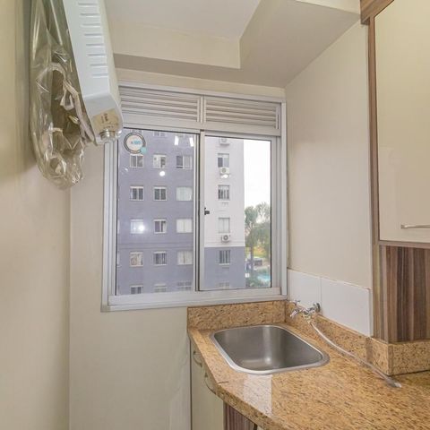 Apartamento à venda com 46m², 2 quartos e 1 vaga Apartamento à venda com 46m², 2 quartos e 1 vagaCozinha e Área de Serviço