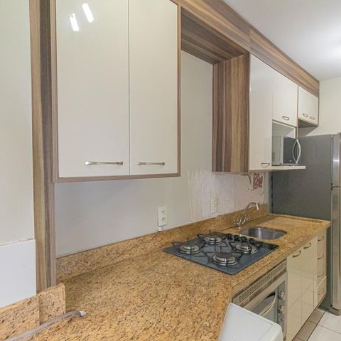 Apartamento à venda com 46m², 2 quartos e 1 vaga Apartamento à venda com 46m², 2 quartos e 1 vagaCozinha e Área de Serviço