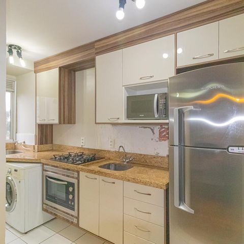 Apartamento à venda com 46m², 2 quartos e 1 vaga Apartamento à venda com 46m², 2 quartos e 1 vagaCozinha e Área de Serviço