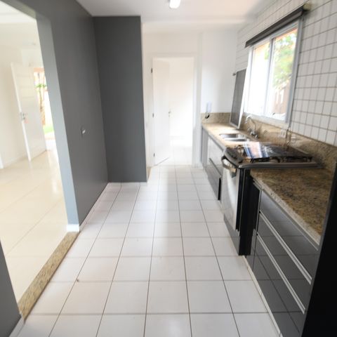 Casa de condomínio para alugar com 220m², 3 quartos e 4 vagasCozinha