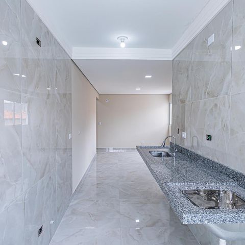 Apartamento à venda com 53m², 2 quartos e 1 vagaCozinha e Área de Serviço
