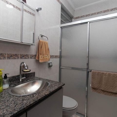 Casa à venda com 111m², 2 quartos e 1 vaga Casa à venda com 111m², 2 quartos e 1 vagaBanheiro da Suíte 1
