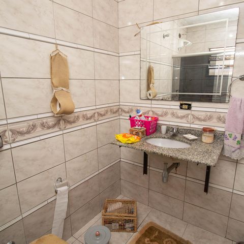 Casa à venda com 150m², 4 quartos e 2 vagasBanheiro da Suíte 2