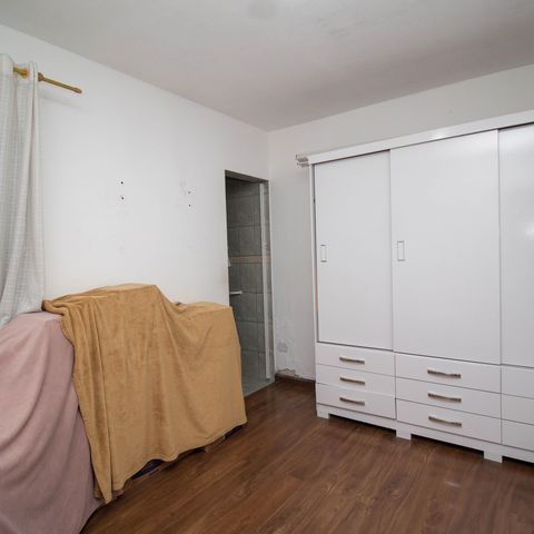 Casa à venda com 150m², 4 quartos e 2 vagasQuarto 1 - Suíte 1