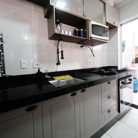 Casa de condomínio à venda com 71m², 2 quartos e 2 vagasSala/Cozinha