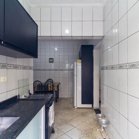Casa à venda com 80m², 2 quartos e 2 vagas Casa à venda com 80m², 2 quartos e 2 vagasCozinha