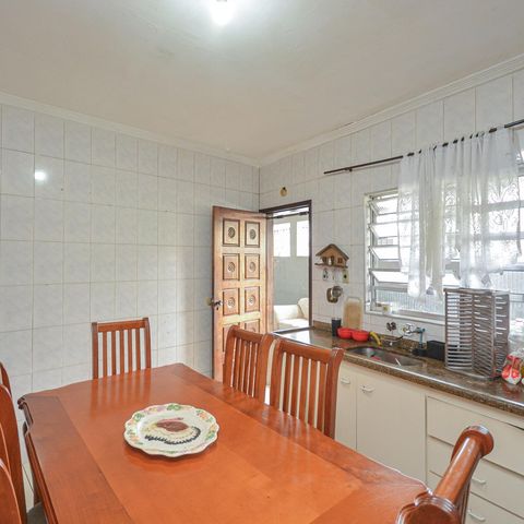 Casa à venda com 220m², 4 quartos e 2 vagas Casa à venda com 220m², 4 quartos e 2 vagasCozinha