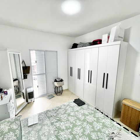 Casa à venda com 124m², 5 quartos e 2 vagasQuarto 3 - Suíte