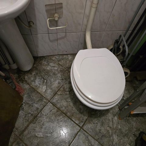 Casa à venda com 400m², 3 quartos e 4 vagas Casa à venda com 400m², 3 quartos e 4 vagasLavabo da Garagem