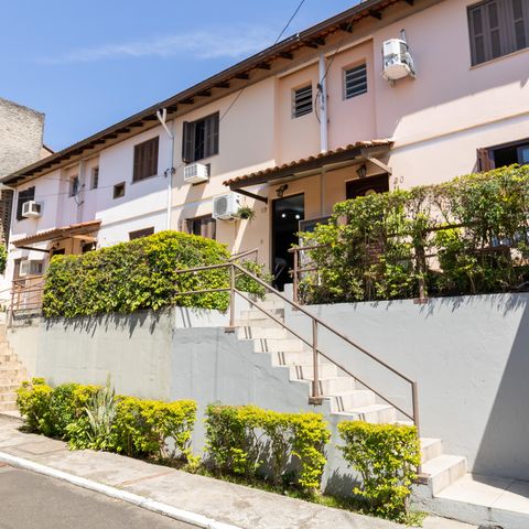 Casa de condomínio à venda com 90m², 3 quartos e sem vaga Casa de condomínio à venda com 90m², 3 quartos e sem vagaFachada