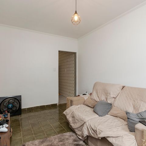 Casa à venda com 130m², 2 quartos e 2 vagasSala