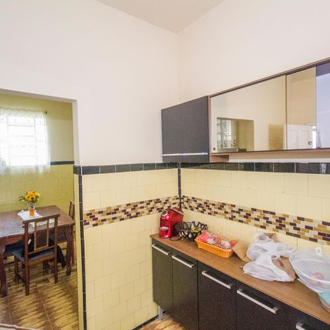 Casa à venda com 140m², 2 quartos e 3 vagas Casa à venda com 140m², 2 quartos e 3 vagasCozinha e Área de Serviço