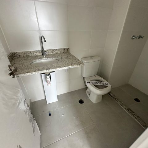 Apartamento à venda com 58m², 2 quartos e 1 vaga Apartamento à venda com 58m², 2 quartos e 1 vagaBanheiro da Suíte