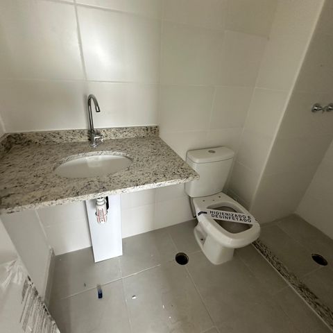 Apartamento à venda com 58m², 2 quartos e 1 vaga Apartamento à venda com 58m², 2 quartos e 1 vagaBanheiro da Suíte