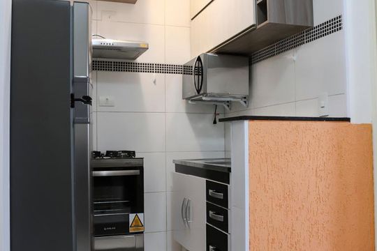 Sala e cozinha de apartamento para alugar com 1 quarto, 35m² em Bela Vista, São Paulo