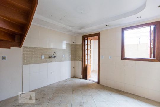 Cozinha de casa de condomínio para alugar com 3 quartos, 100m² em Camaquã, Porto Alegre