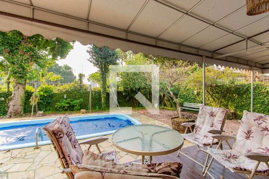Área comum de casa à venda com 4 quartos, 400m² em Igara, Canoas