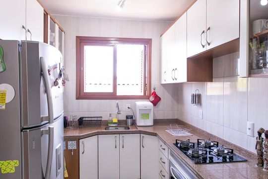Cozinha de casa de condomínio à venda com 3 quartos, 130m² em Santa Tereza, Porto Alegre