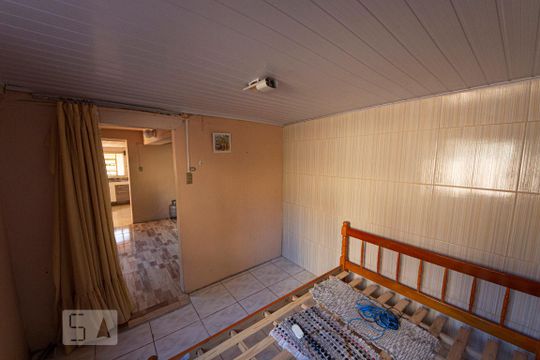 Dormitório de casa à venda com 1 quarto, 30m² em Vila Nova, Novo Hamburgo