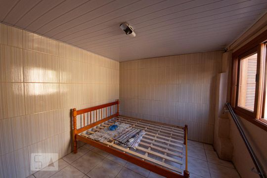Dormitório de casa à venda com 1 quarto, 30m² em Vila Nova, Novo Hamburgo