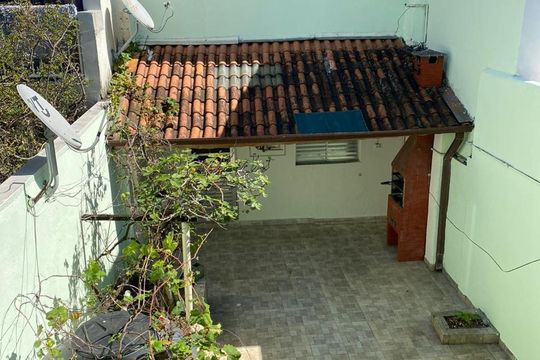 Vista Quintal de casa à venda com 4 quartos, 229m² em Pestana, Osasco