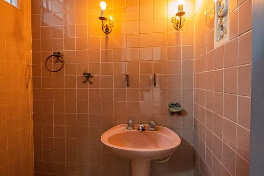 Banheiro 1 de casa para alugar com 4 quartos, 150m² em Auxiliadora, Porto Alegre