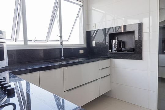 Cozinha de apartamento à venda com 3 quartos, 101m² em São João, Porto Alegre
