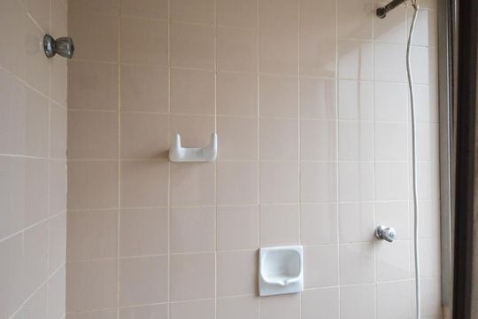 Banheiro de serviço de apartamento à venda com 2 quartos, 96m² em Jardim Paulista, São Paulo