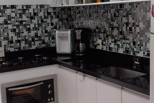 Cozinha de apartamento para alugar com 2 quartos, 58m² em Vila Pierina, São Paulo