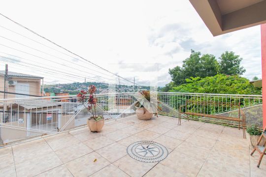 Varanda da sala de casa à venda com 3 quartos, 165m² em Santa Tereza, Porto Alegre